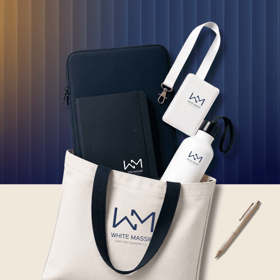 White Massif branded conference delegate kit with tote bag, laptop sleeve, notebook, lanyard and bottle