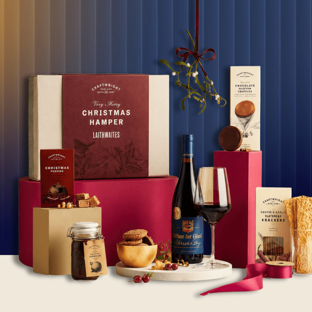 Year-end festive hamper with Christmas gift box, wine, truffles, preserves and crackers